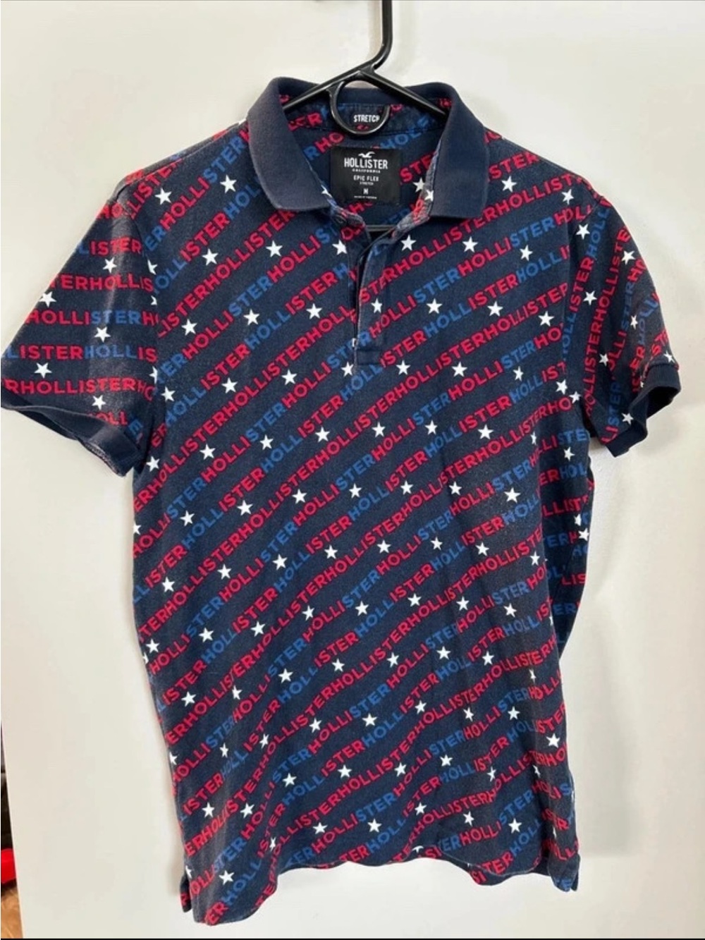 Hollister Navy Polo with Red & Blue Logo Star Pattern